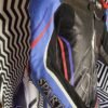 "Tuta Sparta Verona ultraleggera progettata per motard, supermotard, pitbike, Ohvale e moto da velocità, con materiali premium e protezioni integrate CE."